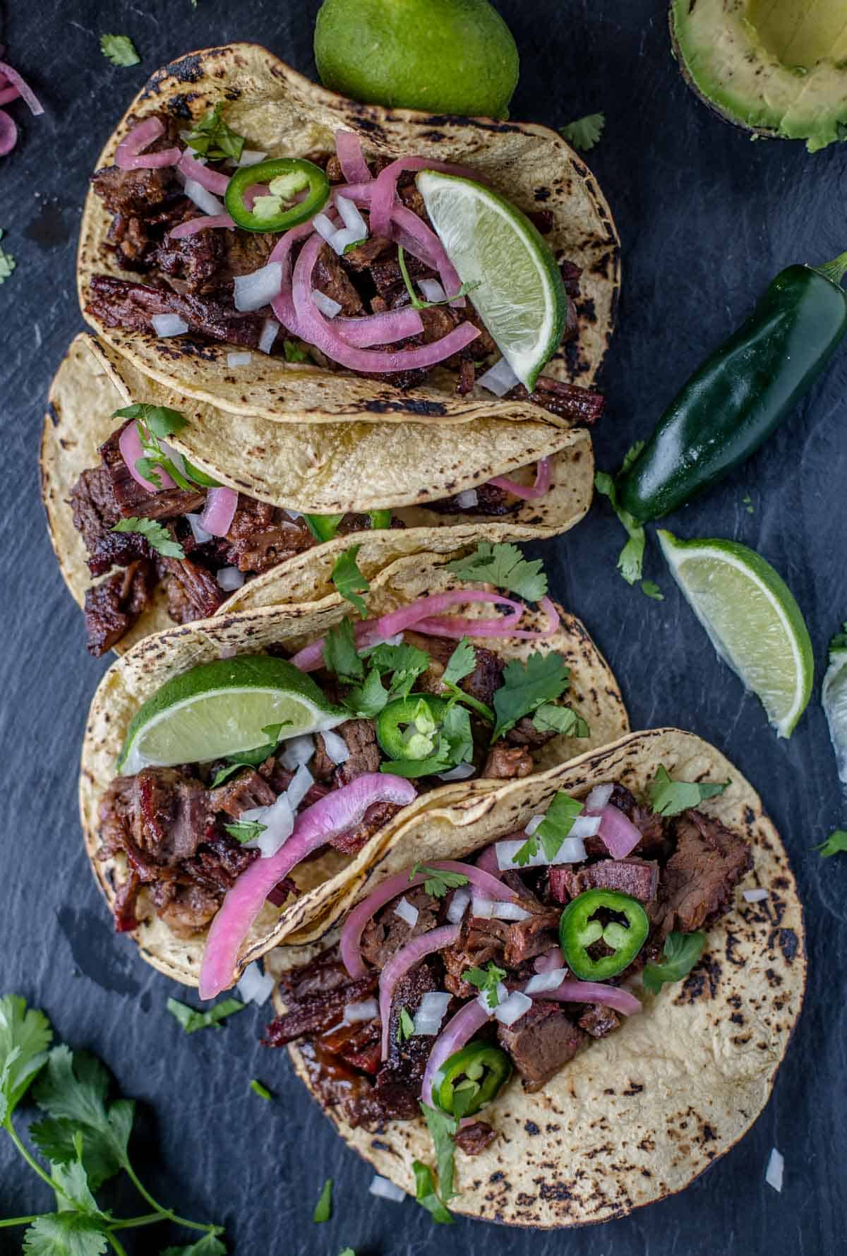 Brisket Tacos made with leftover smoked brisket on a serving platter