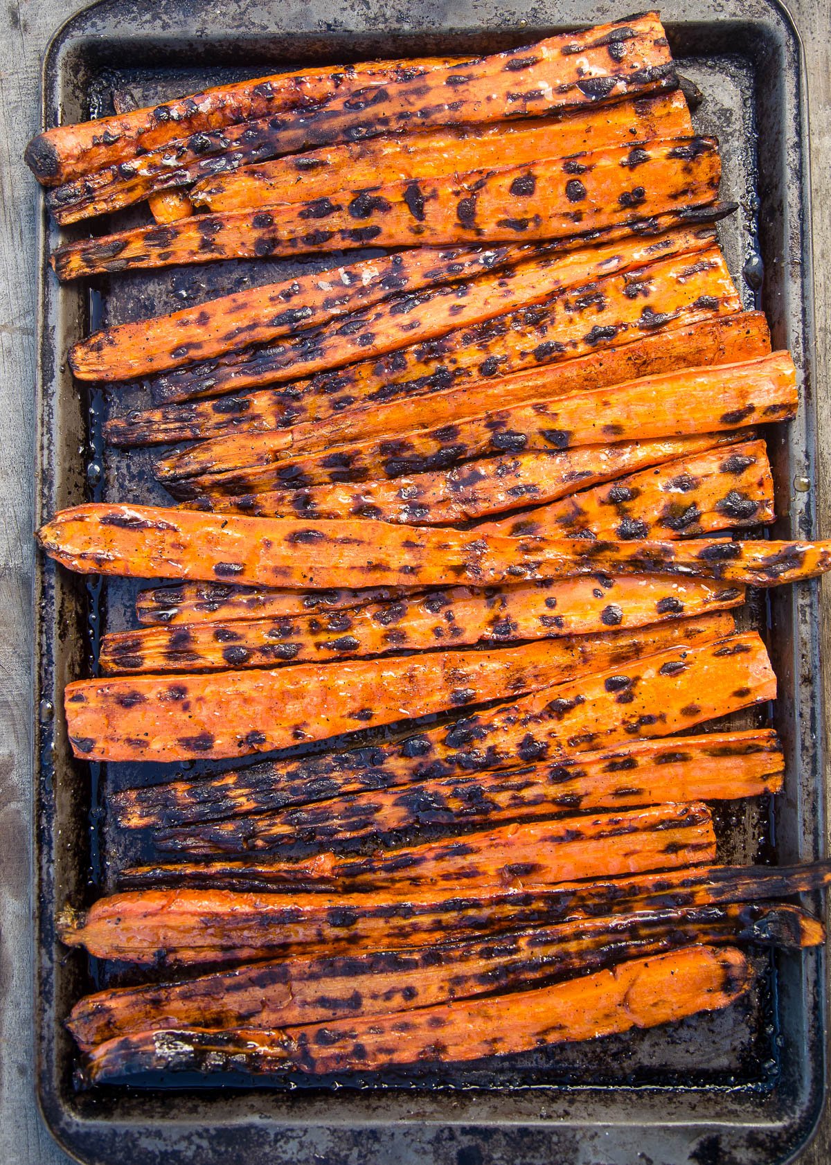 Grilled Carrots on a sheet pan 