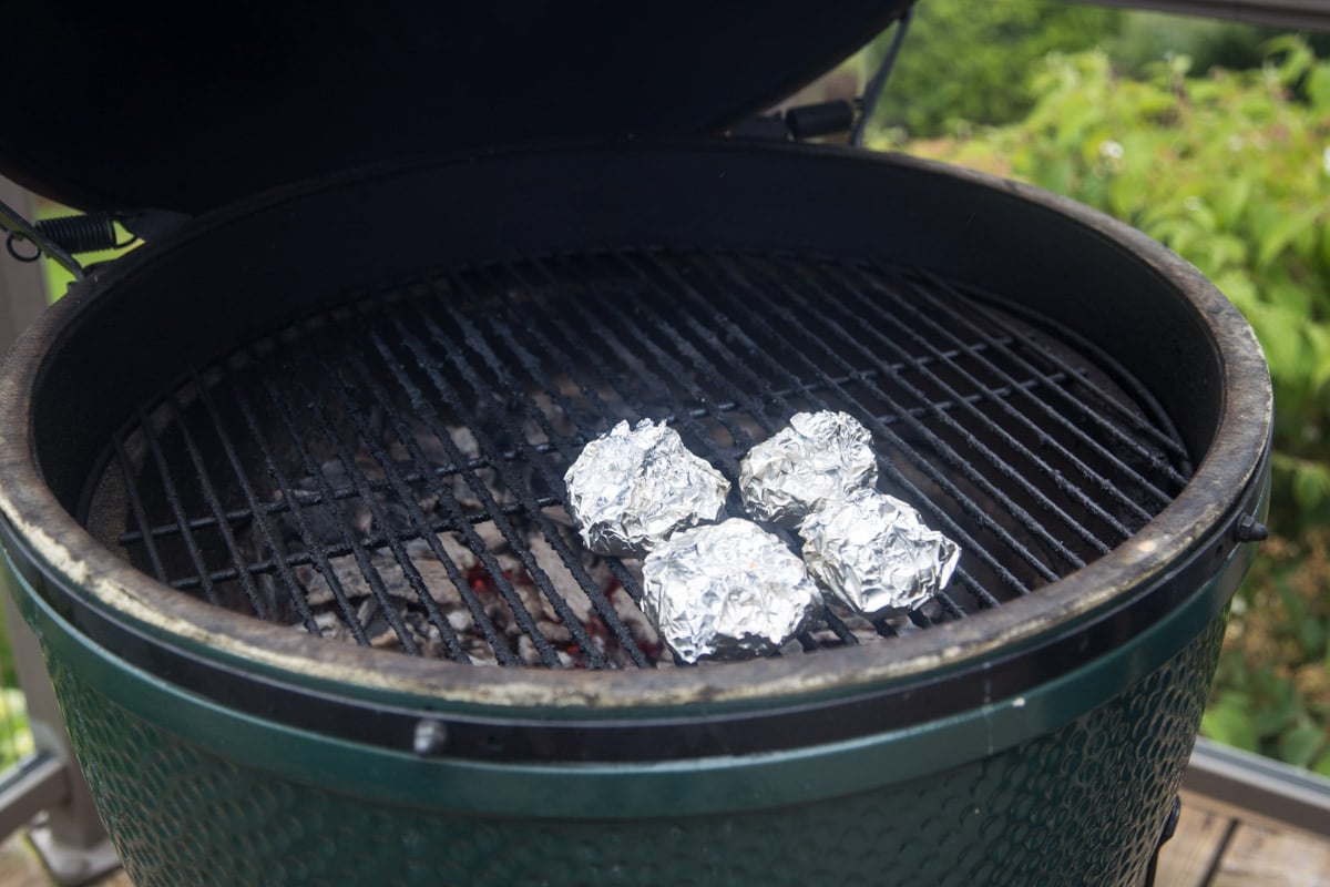 Roasting garlic bulbs on the grill