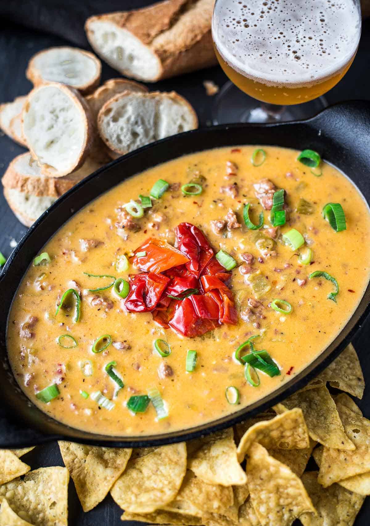 Smoked Sausage Hatch Chile Beer Cheese Dip in a serving dish