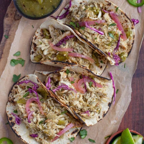 Verde chicken tacos on a serving platter