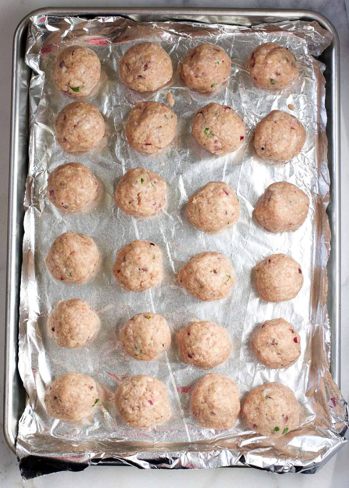 Turkey meatballs on a sheet pan.
