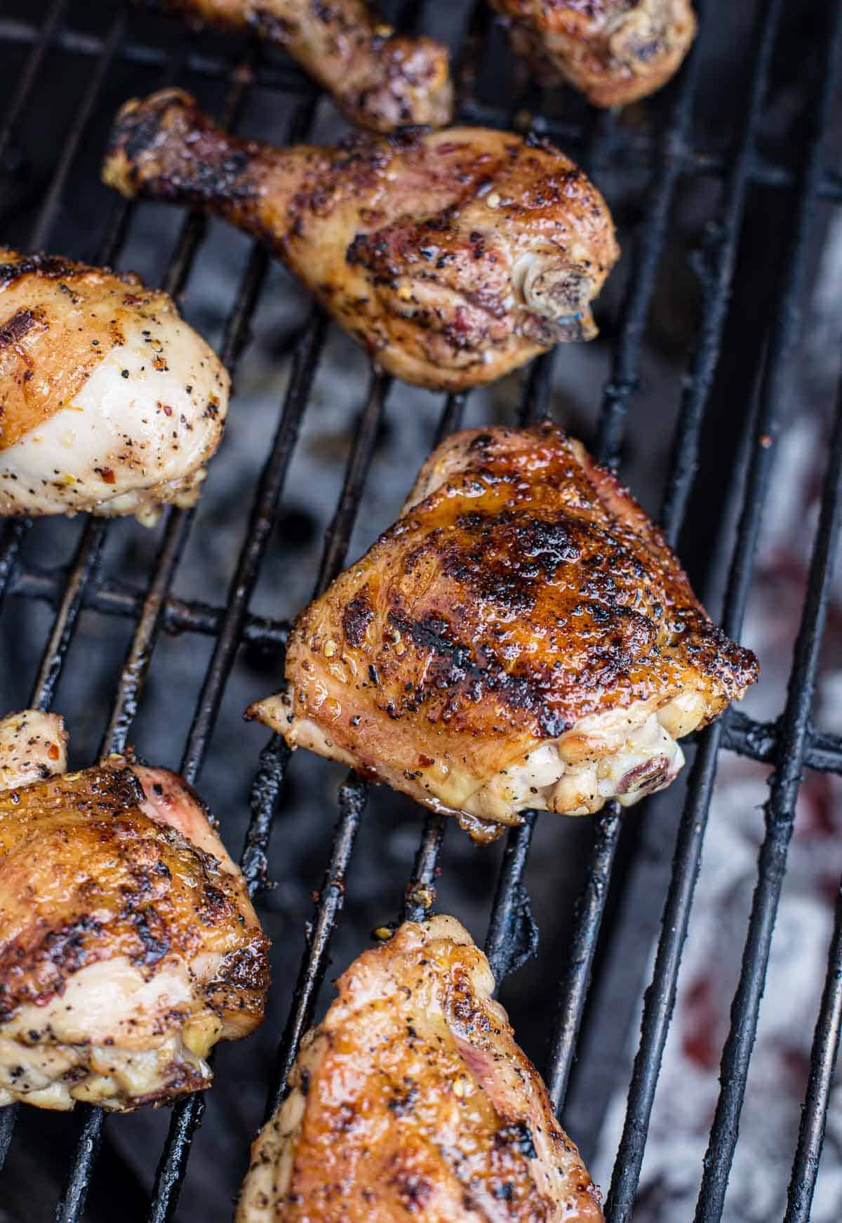 Grilling Hot Honey Chicken over the grill