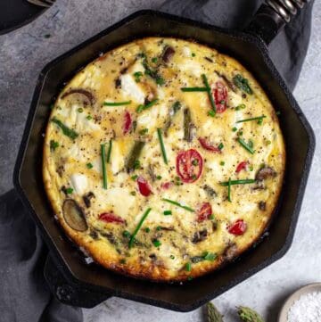 A grilled vegetable frittata in a Finex cast iron pan