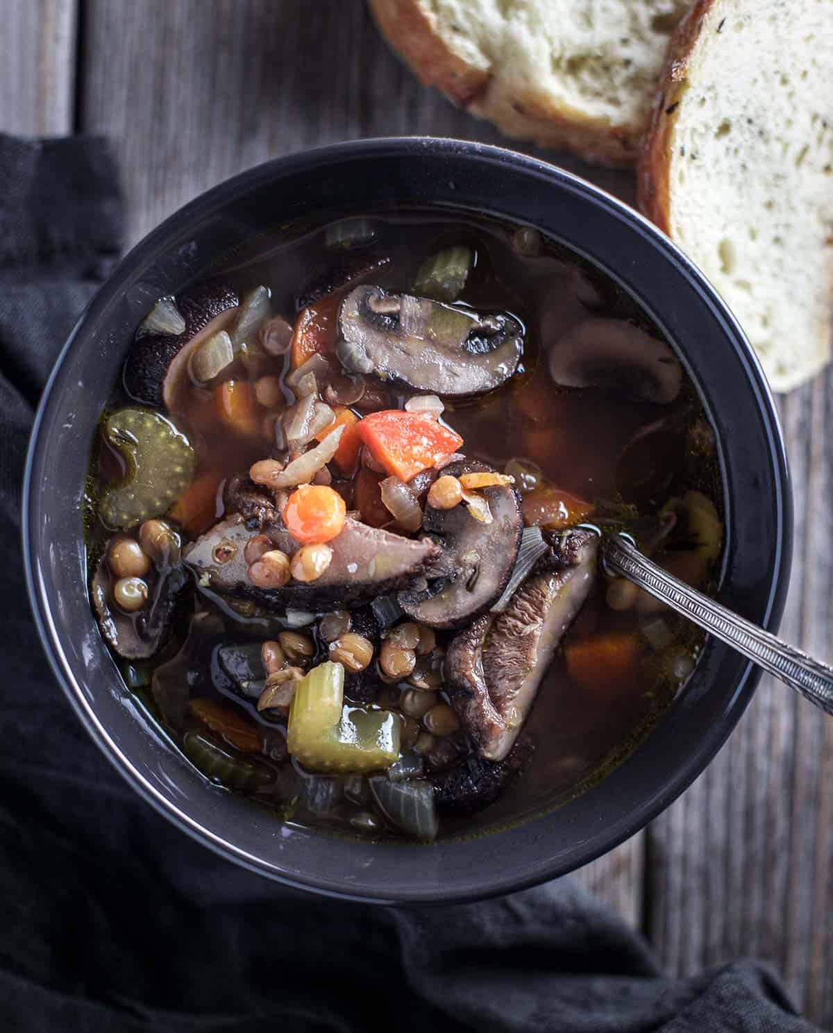 Lentil soup with smoked mushrooms in a bowl