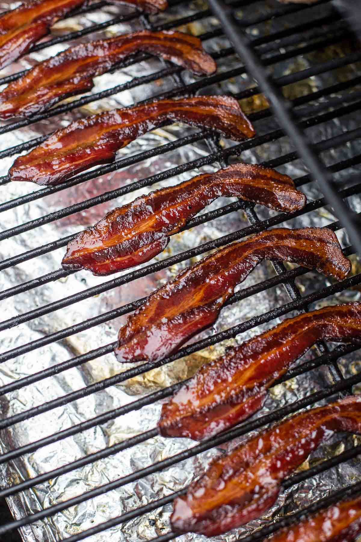 Smoking slices of Bacon on a smoker