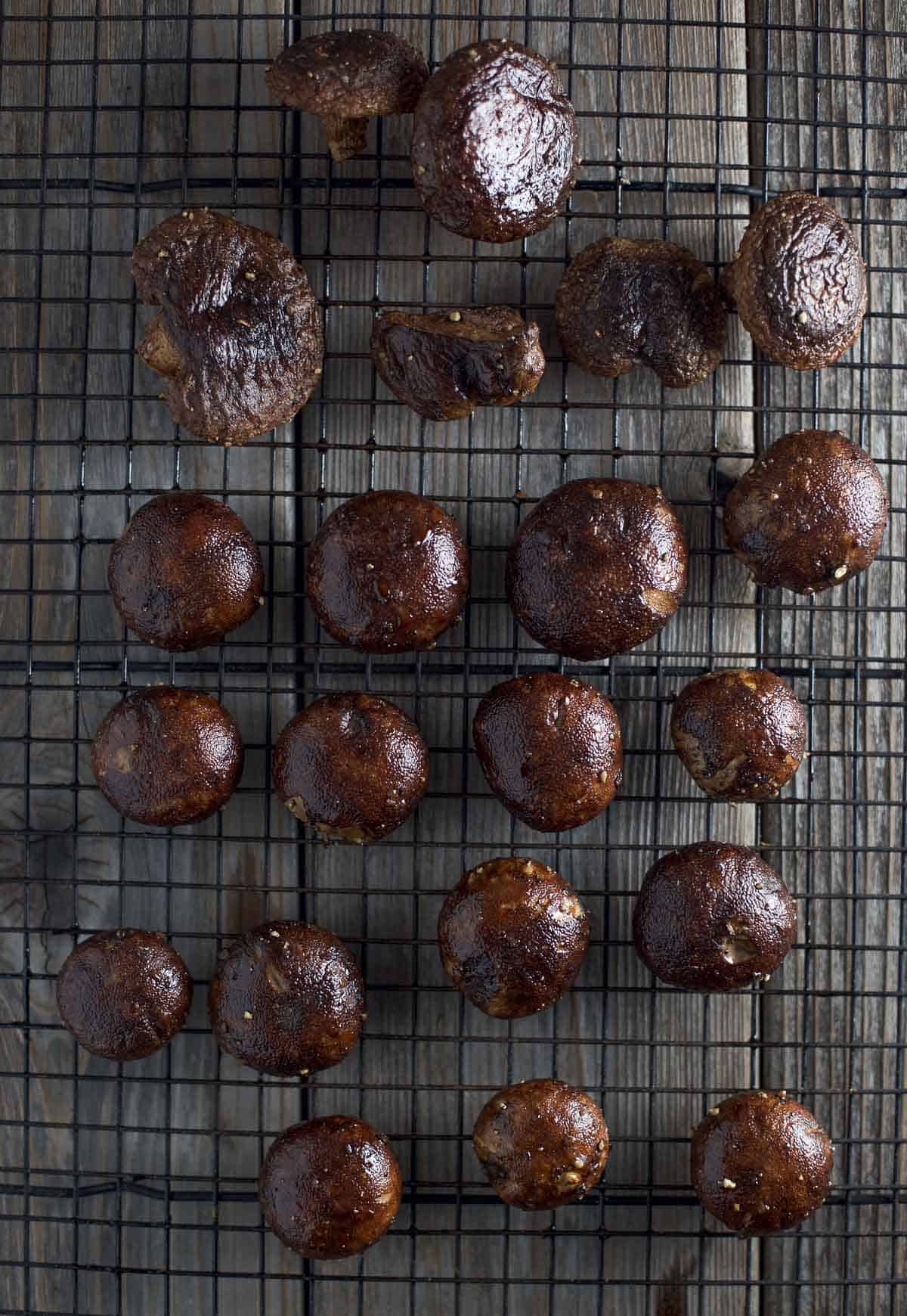 Mushrooms after they have been smoked on a cookie drying rack.