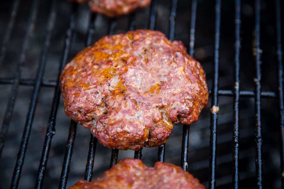 A burger on the grill