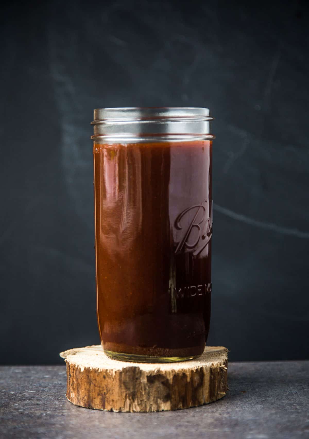 Vinegar Based BBQ Sauce in a glass jar 