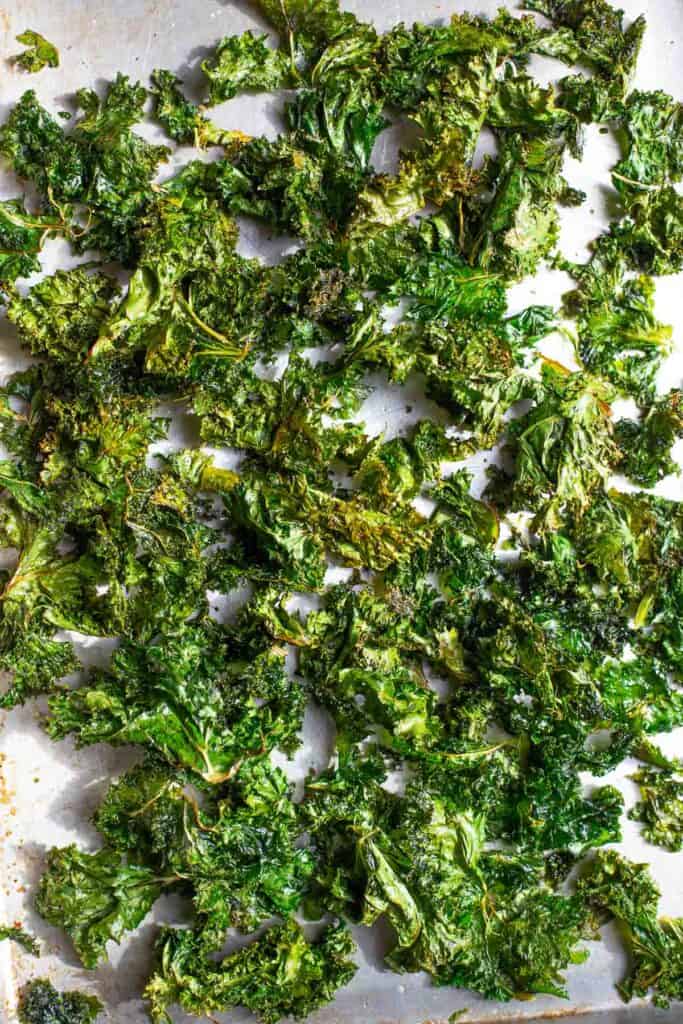 Crispy Smoked Kale Chips on a sheet pan 