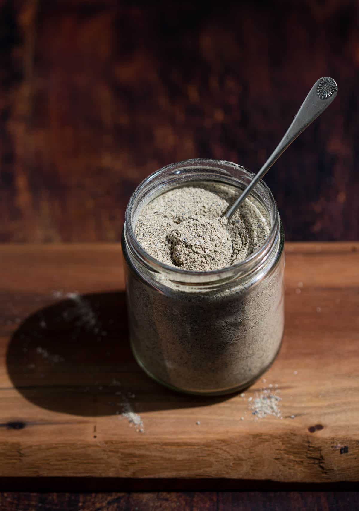 Steak Rub in a mason jar on a wood board