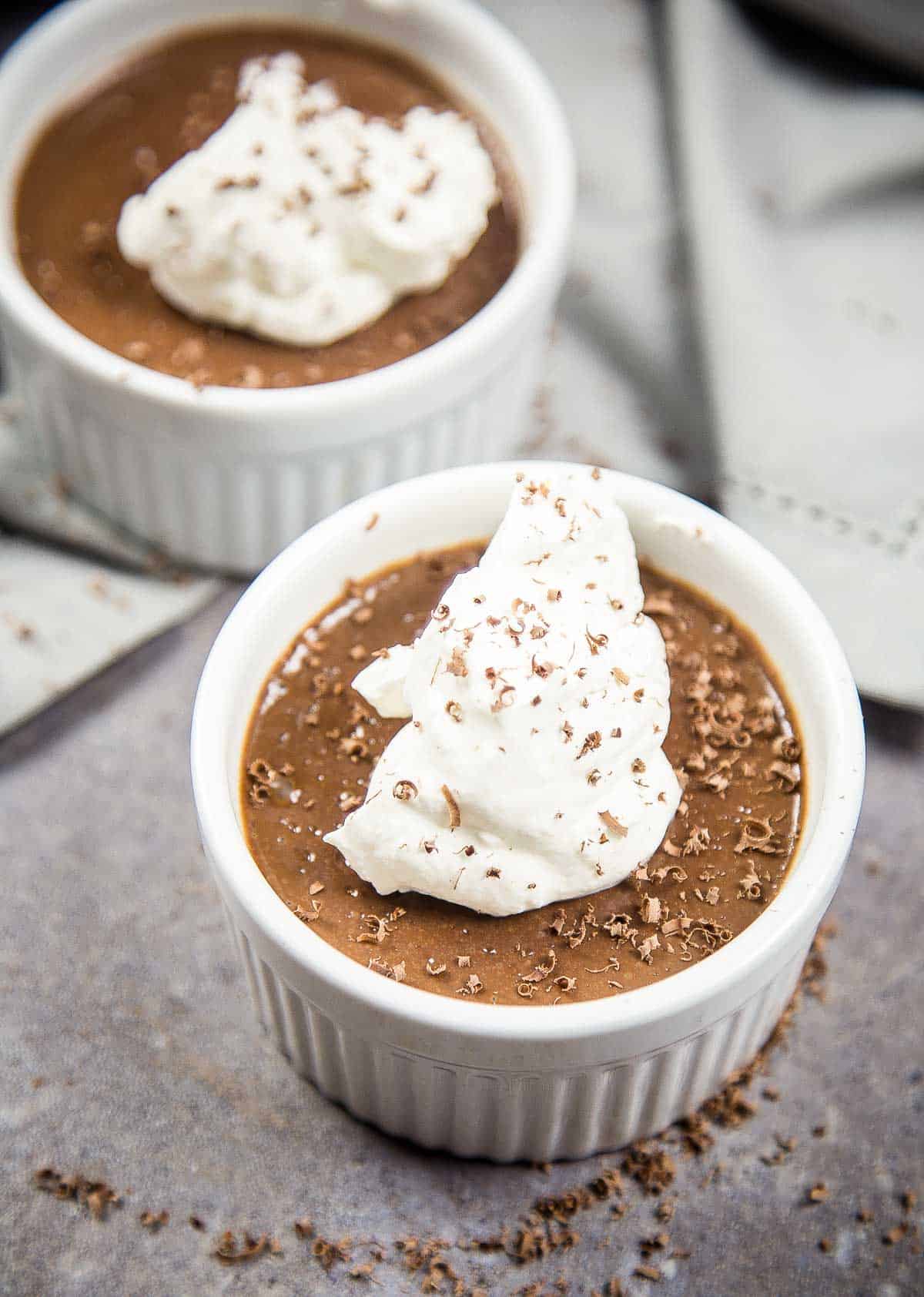 two ramekins with Smoked Chocolate Pot de Creme