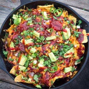 Pulled pork nachos in cast iron skillet.