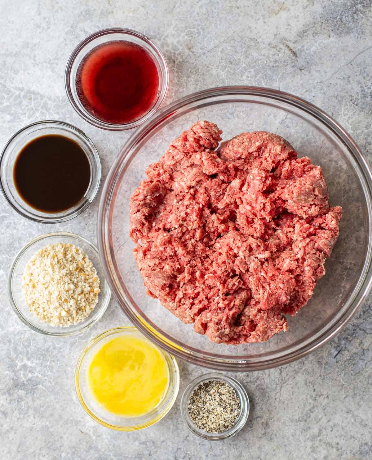 Ingredients for BBQ Meatballs with a red wine BBQ sauce on a counter