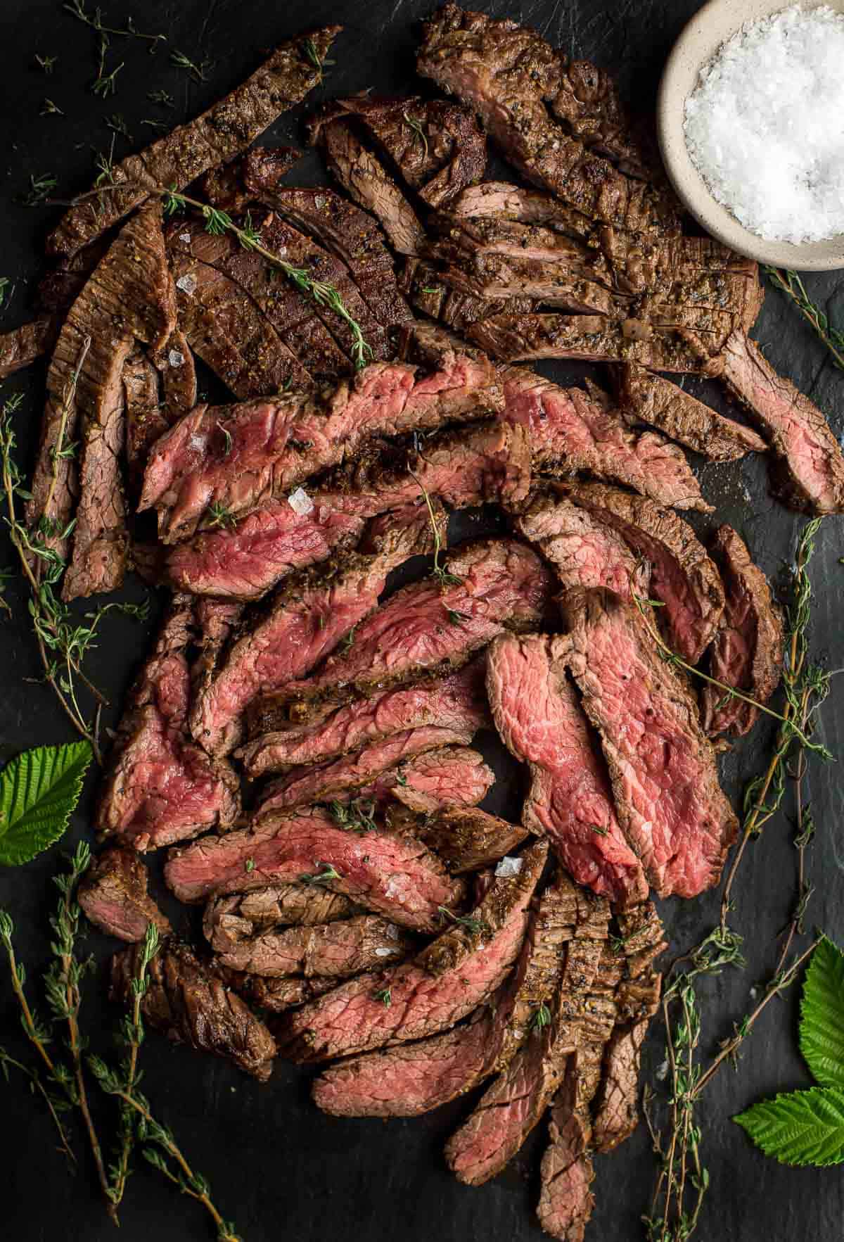 Grilled Bavette steak on a cutting board with a beer based Beef marinade.