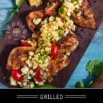 Grilled Chicken Breasts with Grilled Corn and Poblano Salsa on a serving platter