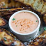 A bowl of the best Fry Sauce surrounded by grilled potato wedges
