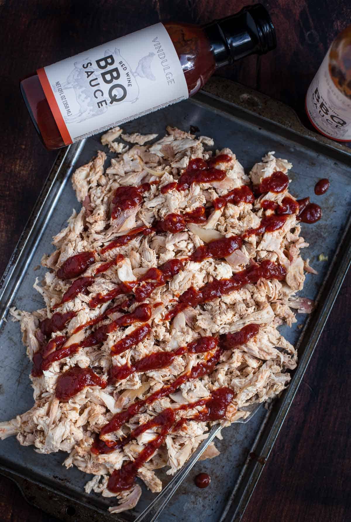 Red Wine Sauced Pulled chicken from Vindulge featuring their red wine bbq sauce bottle.