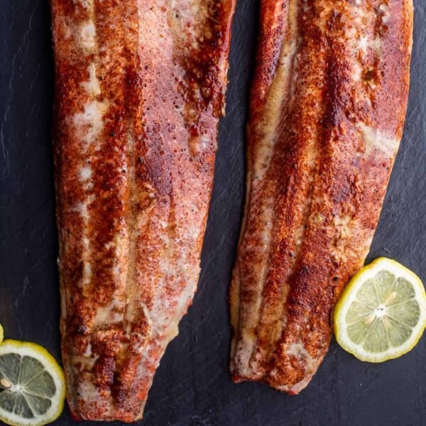 Two filets of Smoked Sockeye Salmon on a serving dish