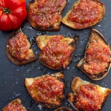 Spanish Tomato Toast (pan con tomate) on a serving platter