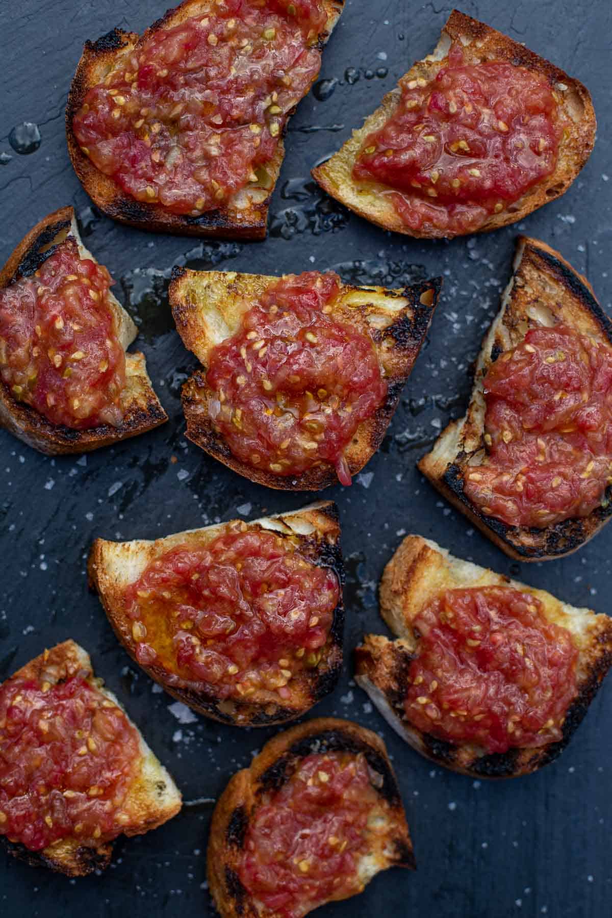 Spanish Tomato Bread, pan con tomato, on a serving platter