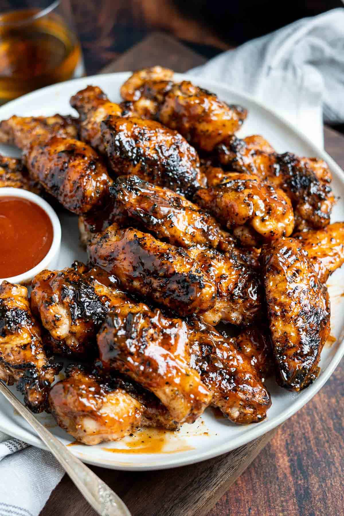 Honey Bourbon Grilled wings on a platter.