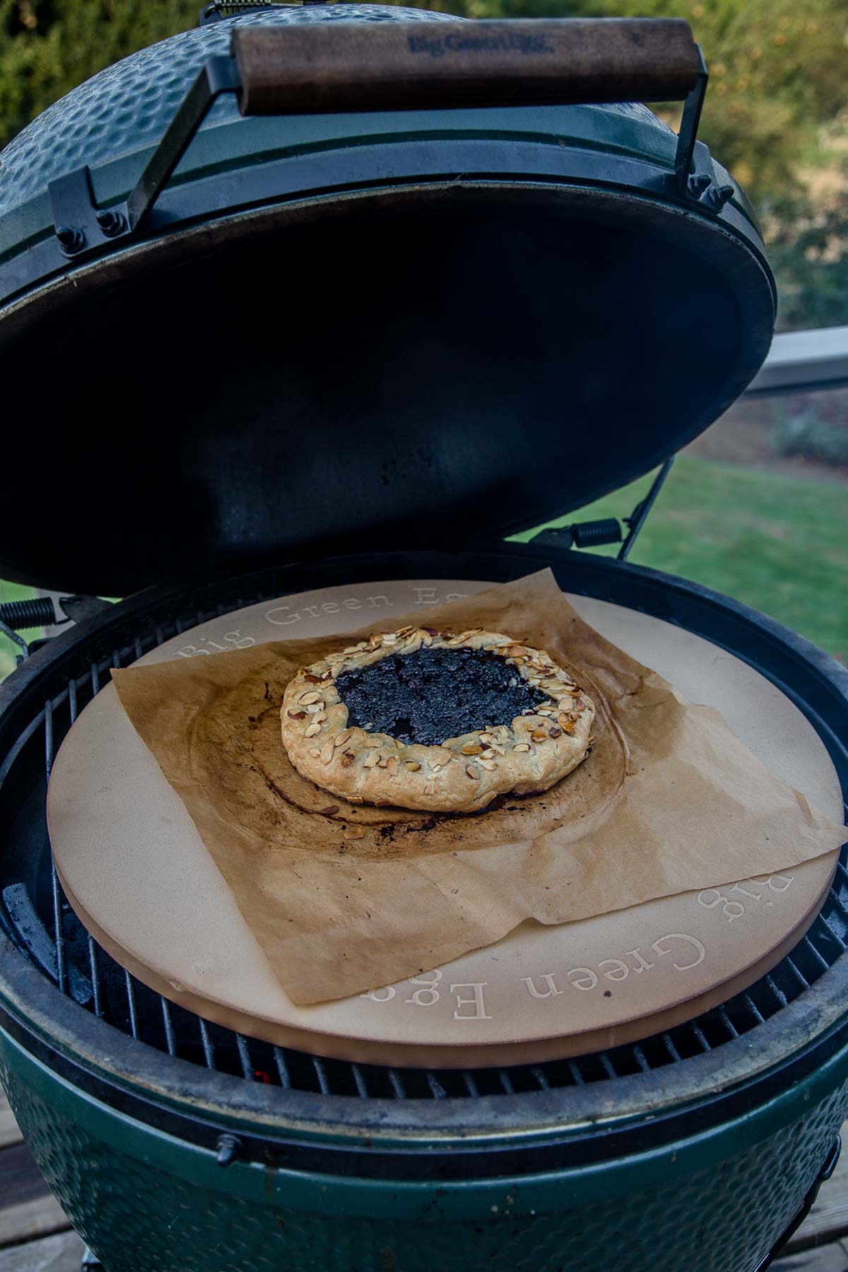 Blackberry crostata cooking on a Big Green Egg grill