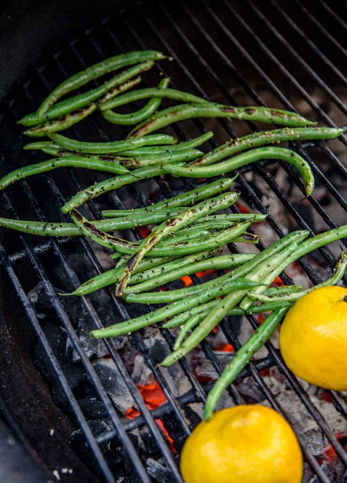 Green beans cooking on a grill