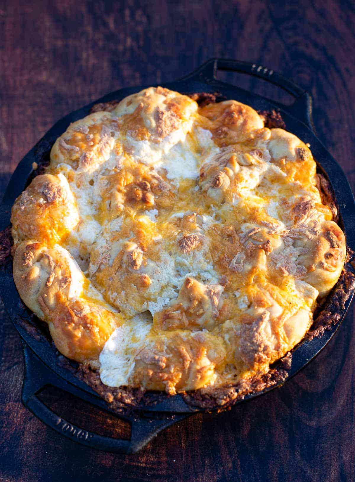 Easy Grilled Buffalo Chicken Pull Apart Bread in a cast iron pan