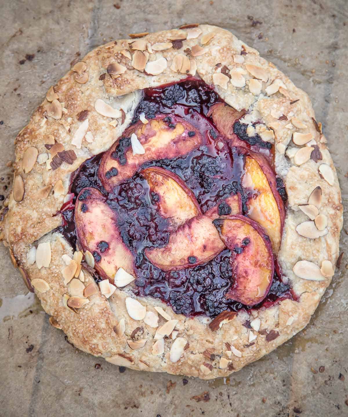 A mixed berry and fruit crostata o a platter