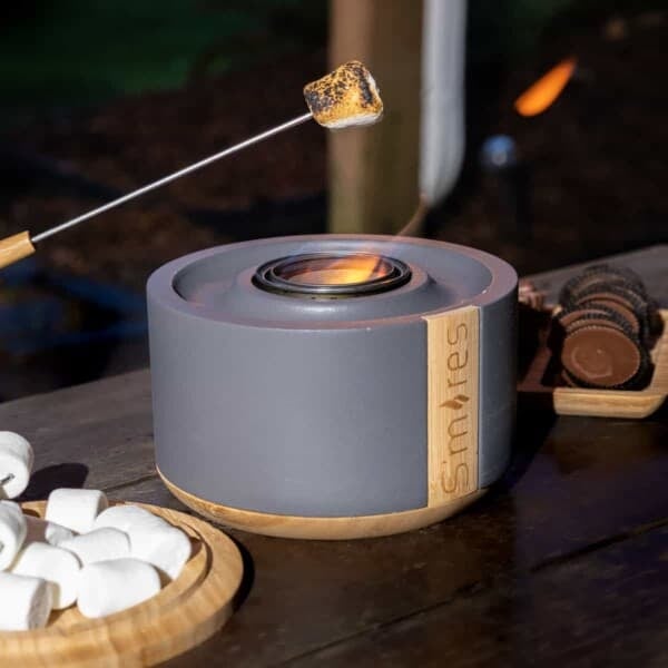 Terraflame S'mores kit being used. A marshmallow is being cooked over the flame.