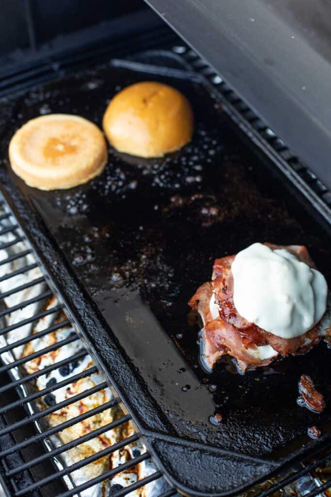 making a fried mortadella sandwich on a hot plancha grill