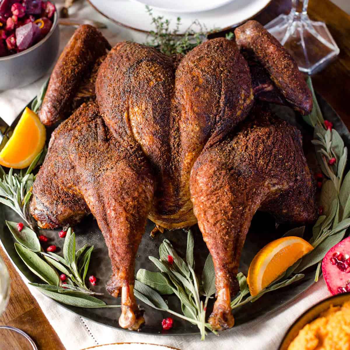 https://www.vindulge.com/wp-content/uploads/2023/11/Pellet-Grill-Smoked-Turkey.jpg