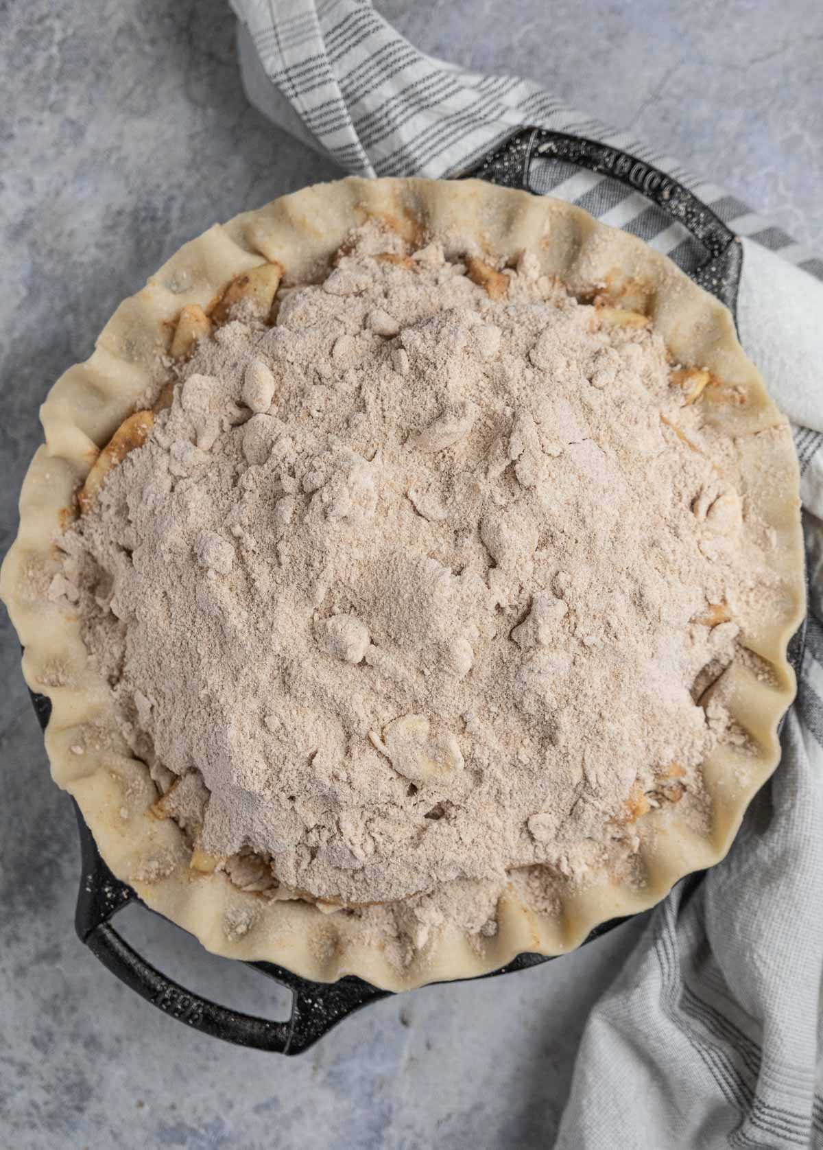 Crumble on top of apple pie filling prior to adding to grill.