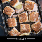 Ham and cheese sliders on a pan