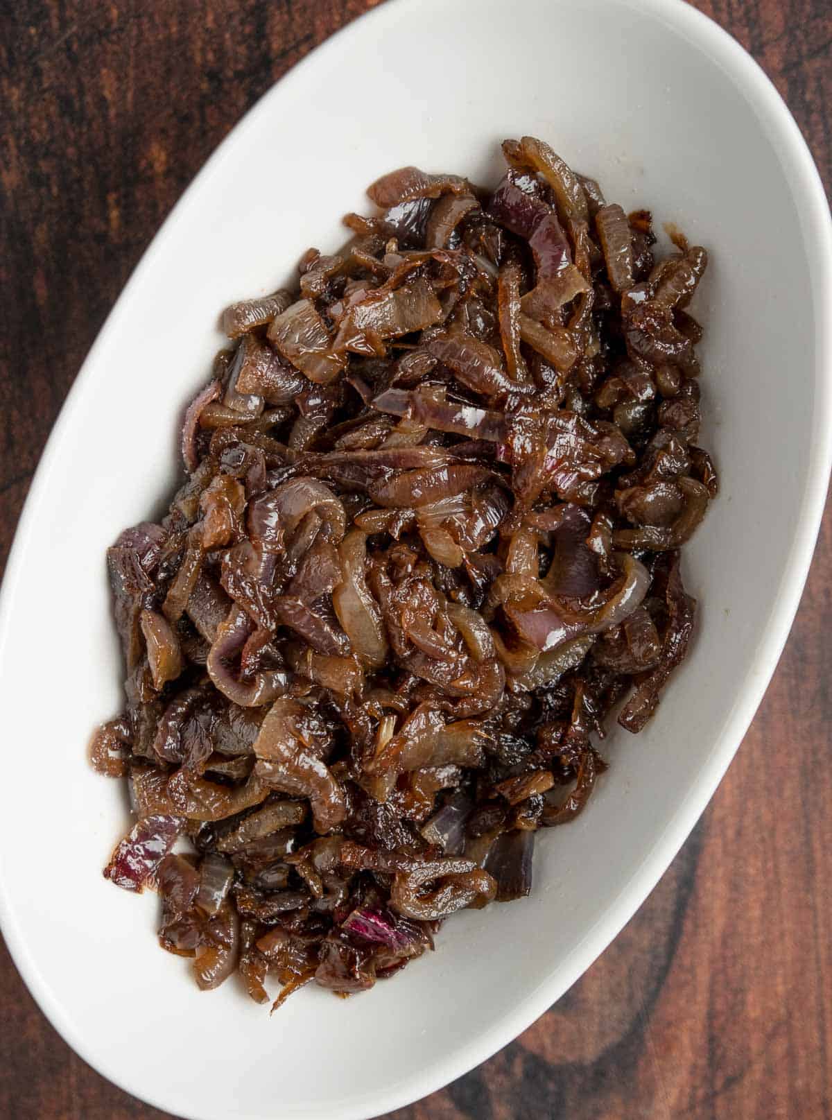 a red caramelized onion in a serving dish