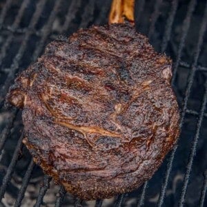Steak cooking on a grill