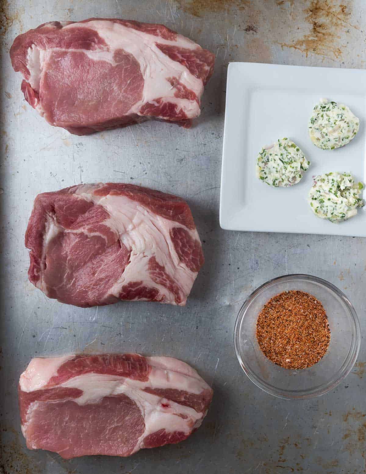 Ingredients for easy grilled pork chops with compound butter
