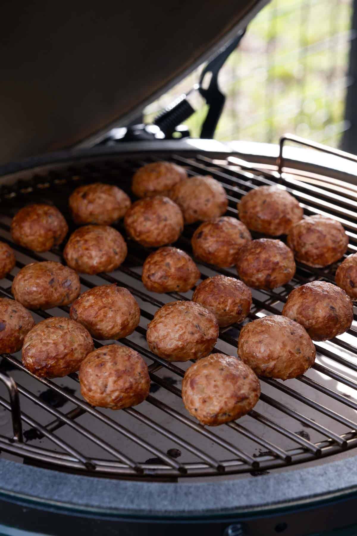 Smoked chicken meatballs on a Big Green Egg.