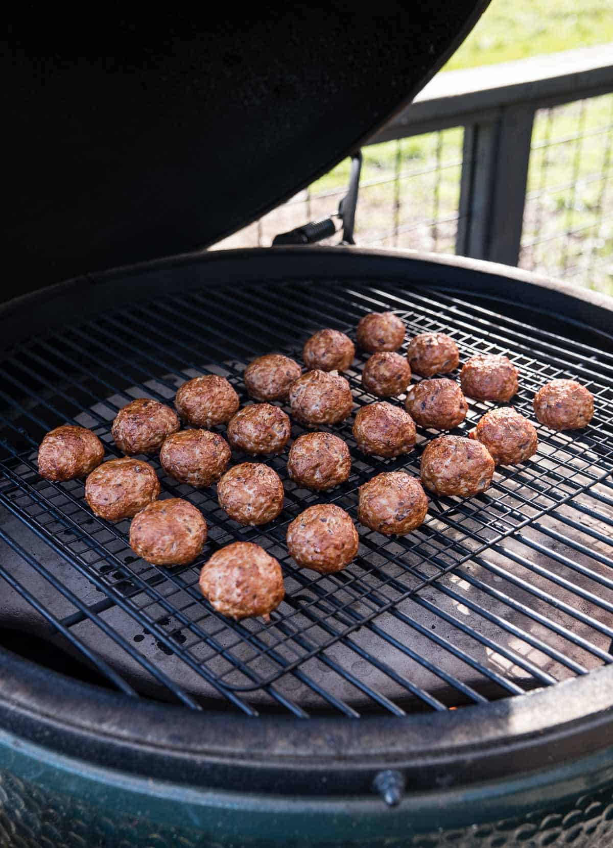 Turkey meatballs on the smoker just before being pulled off and with no sauce on them.