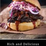 Pinterest Pin showing a brisket sandwich on a bun.