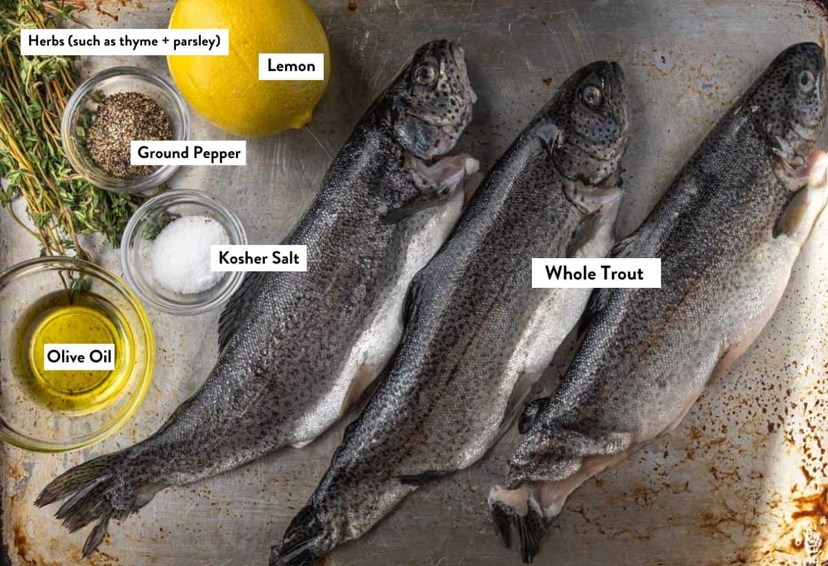Ingredients for whole stuffed trout with ingredient labels. 