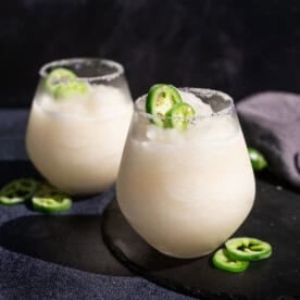 Two Sauvignon Blanc Jalapeño Slushies on a serving platter.