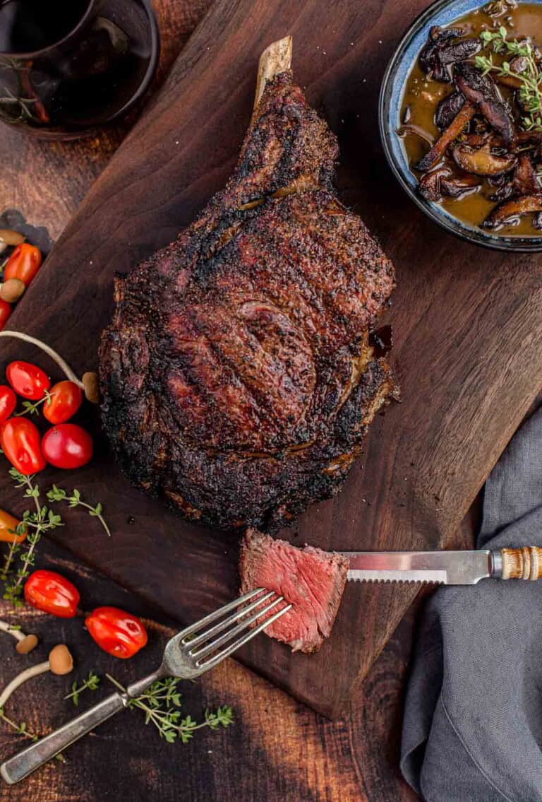 Grilled Cowboy Ribeye Steak With Red Wine and Mushroom Sauce - Vindulge