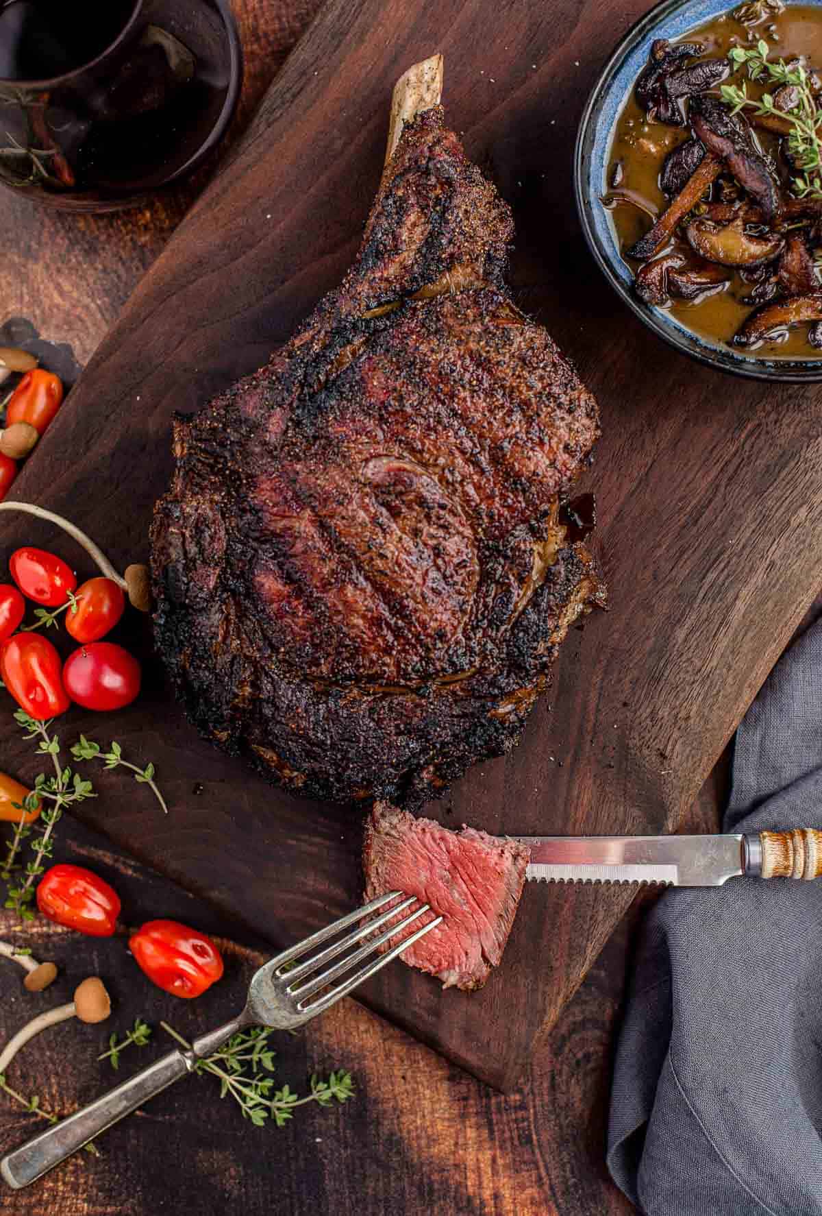 A slice of Grilled Cowboy Ribeye Steak.