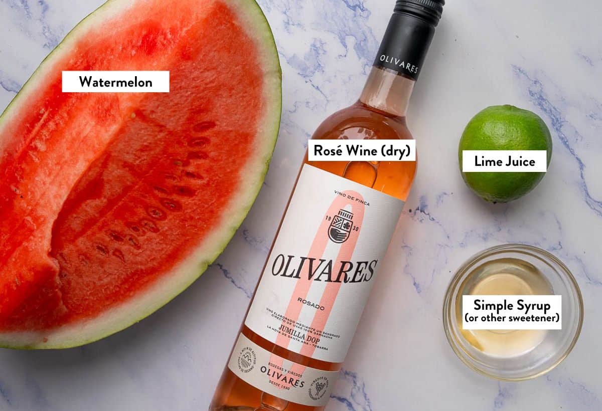 Ingredients for Watermelon Rosé Slushie with written labels. 