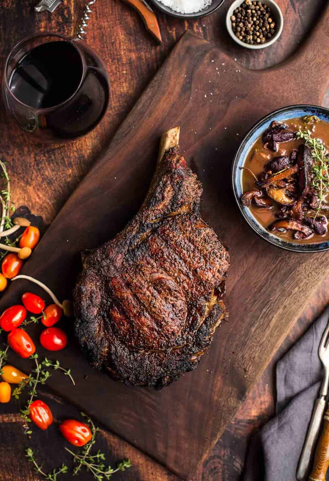 Grilled Cowboy Ribeye Steak With Red Wine and Mushroom Sauce - Vindulge