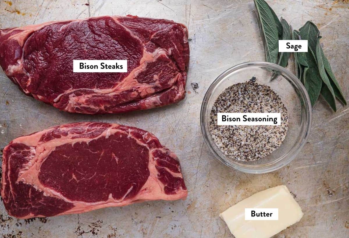 Ingredients for Grilled Bison Steaks with text overlay.