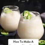 Pinterest pin with two glasses of sauvignon blanc slushie topped with candied jalapeno peppers saying how to make the slushie.