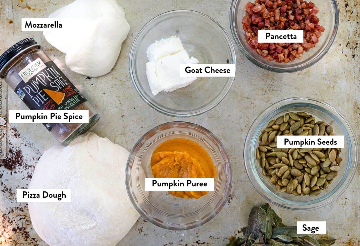 Ingredient photo showing ingredients for a fall pumpkin pizza.